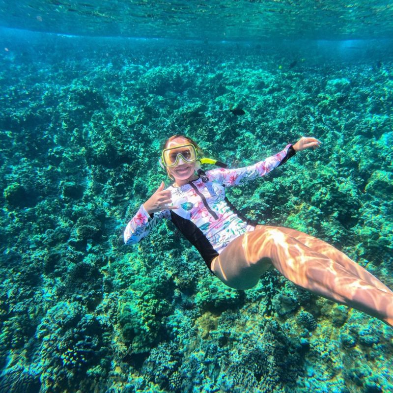 a person swimming in the water