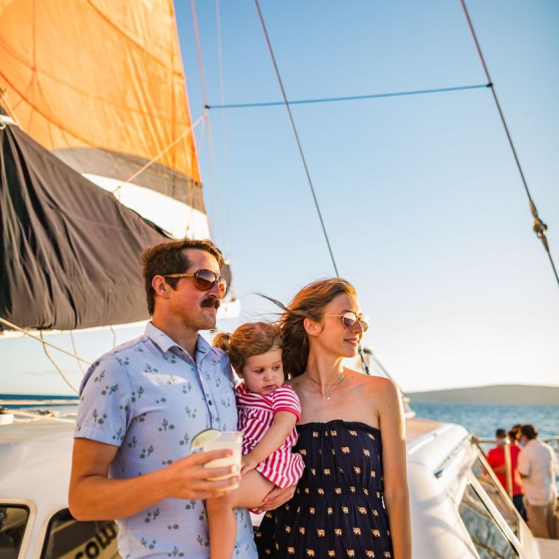 a couple of people that are standing in the water