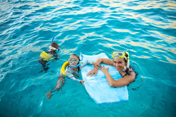 a person swimming in a pool of water
