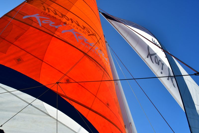 a boat in the middle of a clear blue sky